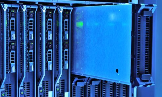 pexels-photo-17489153-17489153 Detailed view of server racks with glowing lights in a data center environment.